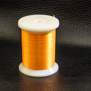 Super Glow UV Thread (orange) par Premium Magic
